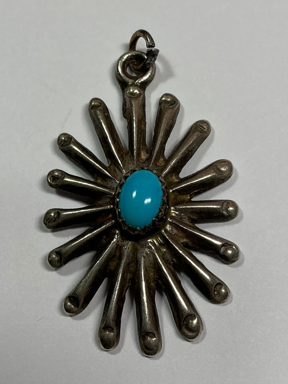 Sterling Silver Sea Urchin Pendant with a Turquoise Gemstone. 1.5 inches long